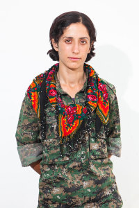 Mizguin Ronahi. Photographed at a YPJ checkpoint-base, on the outskirts of Rabia, Kurdistan, on Aug. 7, 2014.