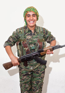 YPJ soldier, Hevedar Mohammed, 12. Photographed at a YPJ training base near Derek City, Syria, Aug. 20, 2014.