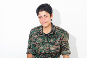 YPJ solider, Narlene, 20. Photographed at a YPJ checkpoint-base, on the outskirts of Rabia, Kurdistan, on Aug. 7, 2014.