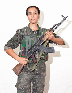 Sa-el Morad, 20. Photographed at a YPJ training base near Derek City, Syria, Aug. 20, 2014.